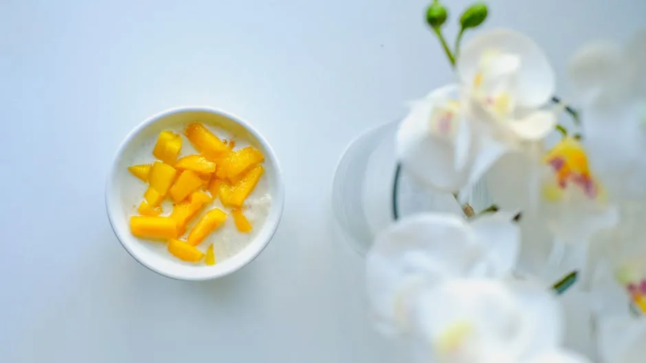 Yogurt with Mango Next to Orchid 