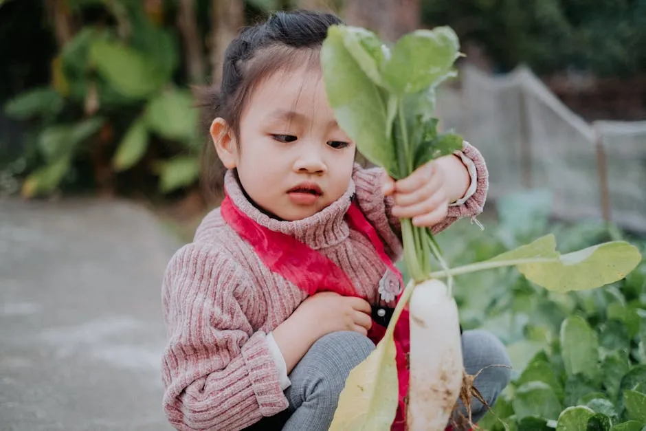 Child Harvesting Fresh Vegetables in Garden