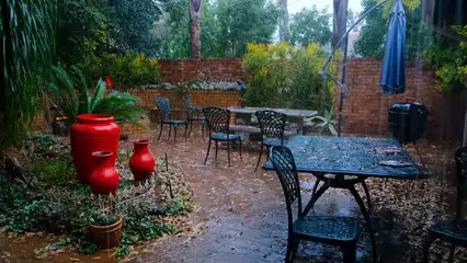 Horizontal video: Rain pouring on the open veranda 4171568. Duration: 45 seconds. Resolution: 3840x2160