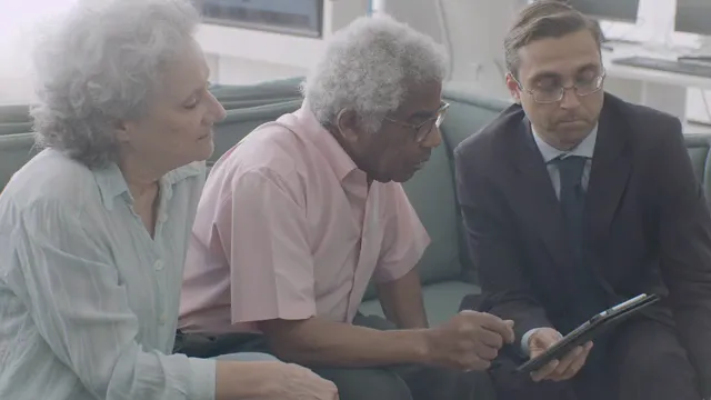 Horizontal video: A man handing a document to an elderly couple 8440642. Duration: 20 seconds. Resolution: 3840x2160