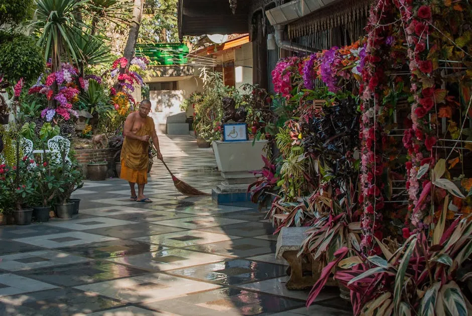 Monk Sweeping Floor in Temple