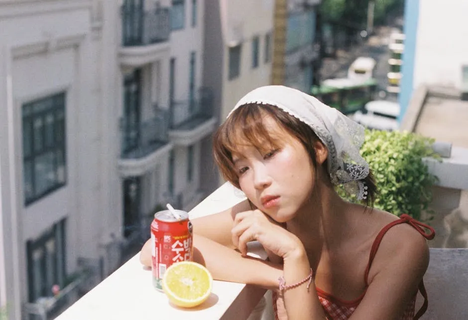 Contemplative Woman Relaxing on Balcony with Drink