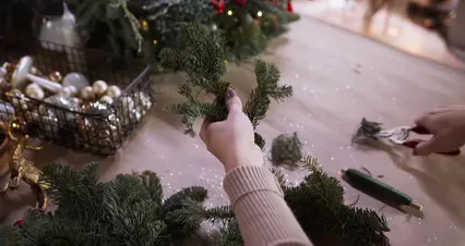 Horizontal video: A close up view of a woman creating a wreath 6063776. Duration: 32 seconds. Resolution: 4096x2160