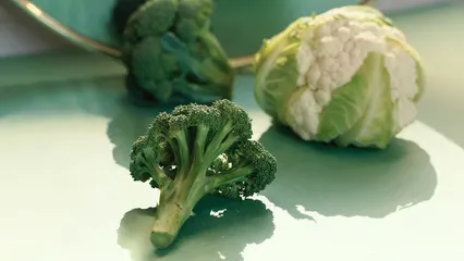 Horizontal video: Close up of a cauliflower and broccoli 5802023. Duration: 14 seconds. Resolution: 1920x1080