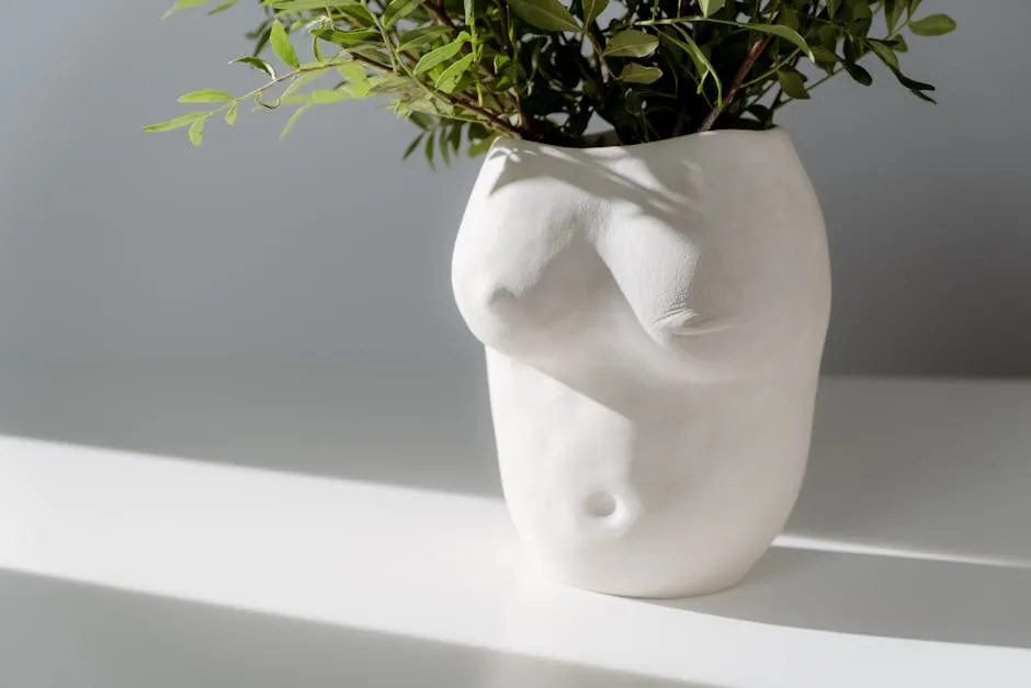 Close-Up Shot of Plants in a White Vase