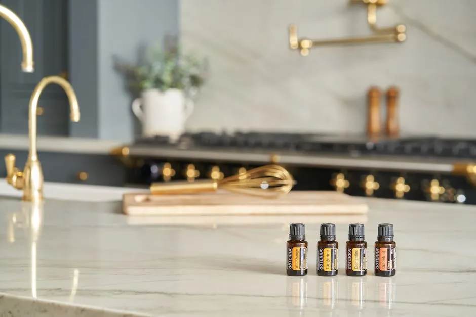 Oil Bottles Near a Wooden Chopping Board and Whisk
