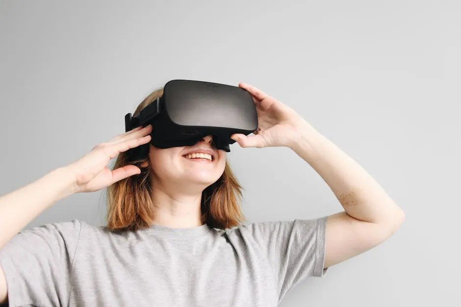 A Happy Woman Wearing VR Headset Near White Wall