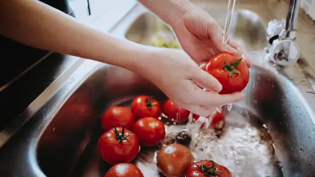 Horizontal video: Close up on washing tomatoes in sink 9823140. Duration: 11 seconds. Resolution: 1920x1080