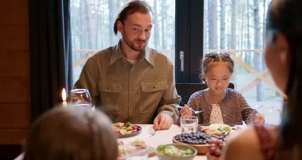 Horizontal video: A happy family eating lunch together 9242979. Duration: 31 seconds. Resolution: 4096x2160