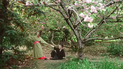 Horizontal video: Couple posing in the garden 7957834. Duration: 19 seconds. Resolution: 3840x2160