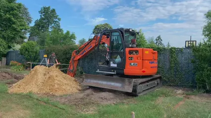 Horizontal video: People digging soil using a mini excavator 5554470. Duration: 14 seconds. Resolution: 1280x720