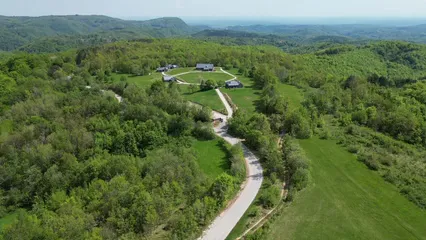 Horizontal video: The aerial view of a large farm with a large house 16739874. Duration: 37 seconds. Resolution: 3840x2160