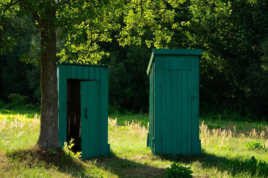 Small Wooden Huts on the Field