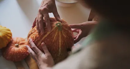 Horizontal video: Cutting a pumpkin in half 5495039. Duration: 41 seconds. Resolution: 4096x2160