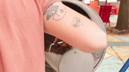 Horizontal video: A man mixing wood shavings 6159972. Duration: 23 seconds. Resolution: 3840x2160