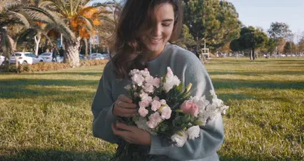 Horizontal video: Happy woman holding flower bouquet 6016550. Duration: 10 seconds. Resolution: 4096x2160