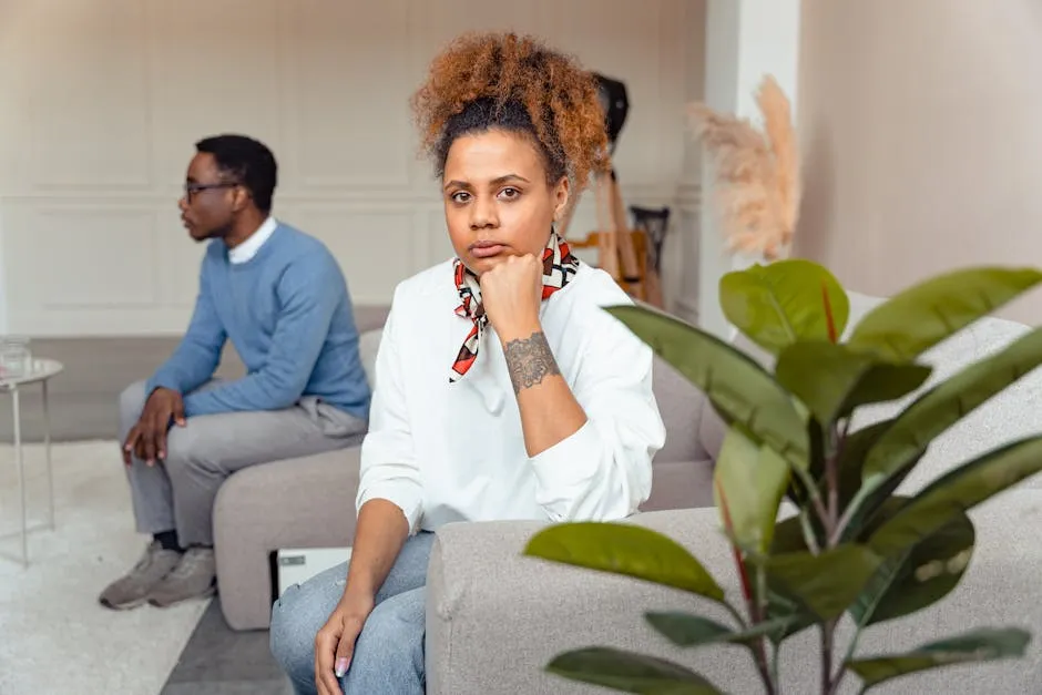 Woman in White Long Sleeves Looking Pensive