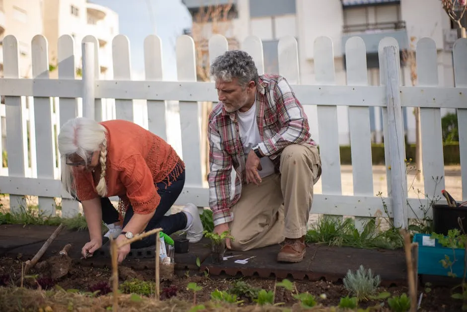 Senior couple planting vegetables in a garden, enjoying outdoor horticulture together.